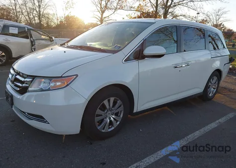2016 Honda Odyssey Se z USA, uszkodzony, nr VIN 5FNRL5H32GB143831